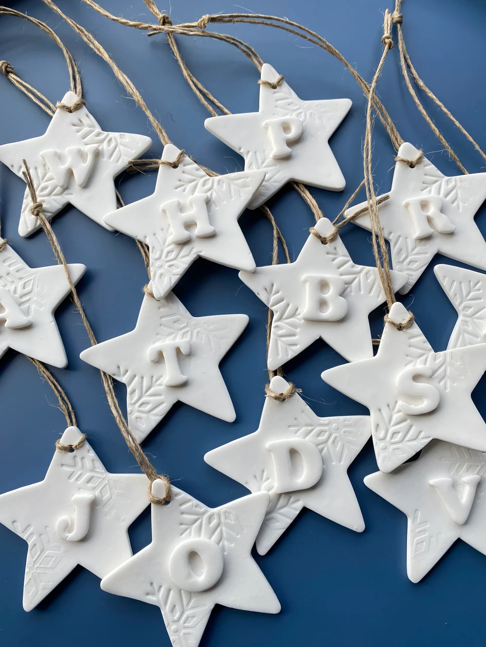 Personalised White Initial Embossed Clay Star Christmas Ornament