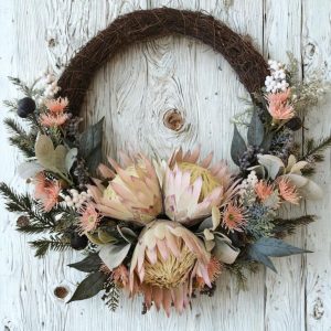 Australian Native Christmas Wreath with Pink Blush Protea, Pink Flowering Gum and Mixed Foliage - Free Aussie Delivery